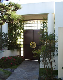 Glass block windows framing entry door.